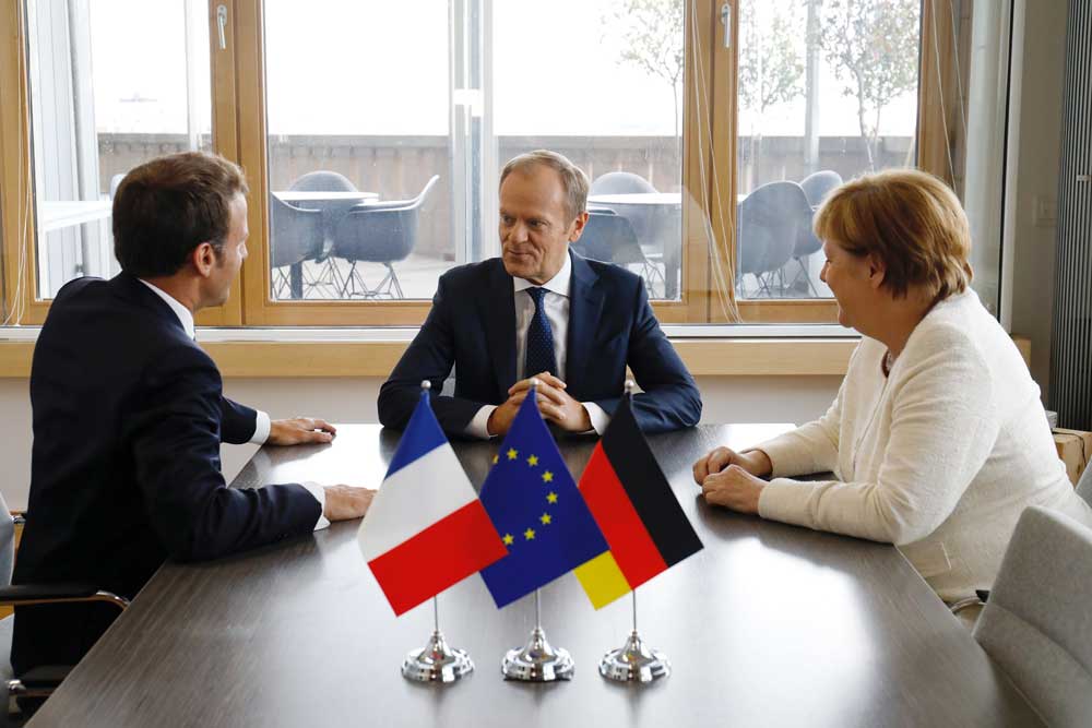 Macron, Tusk ja Merkel tapaamisessa. Kuva: Euroopan unioni